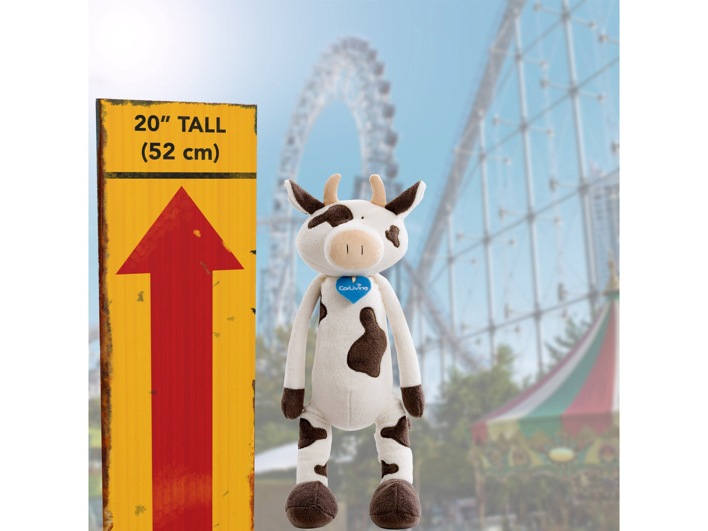 Plush cow toy with black and white spots, soft fur, and a friendly smile.