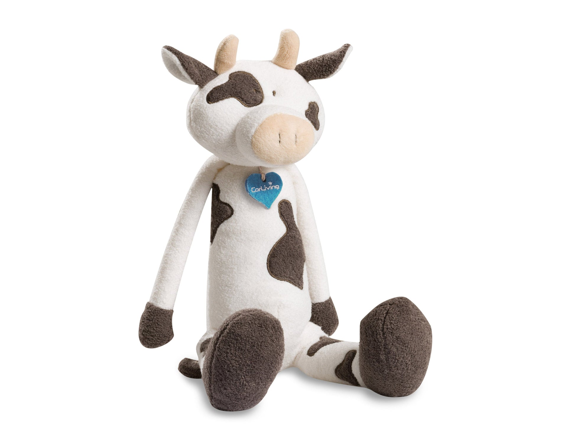 Plush cow toy with soft white and black fur, embroidered eyes, and a cute sitting pose.