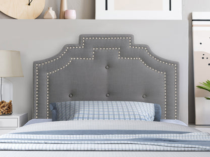 Light grey padded twin headboard with tufted design and soft fabric upholstery.