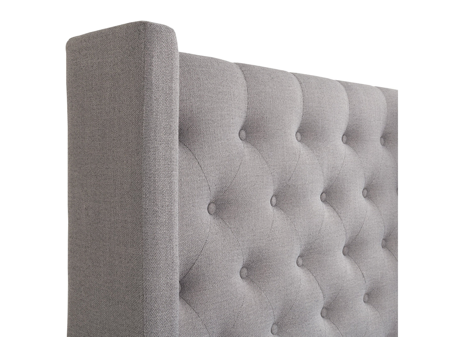 Tufted grey queen bed with upholstered fabric, wooden legs, and elegant button detailing.