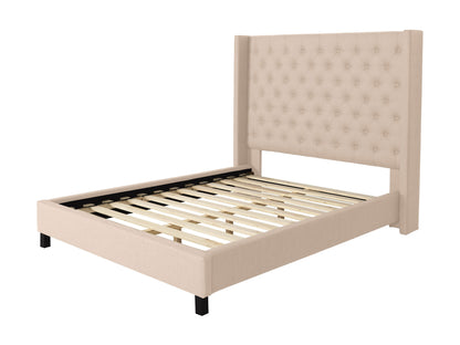 Cream tufted king bed with slats, upholstered headboard, and wooden legs for a modern bedroom.