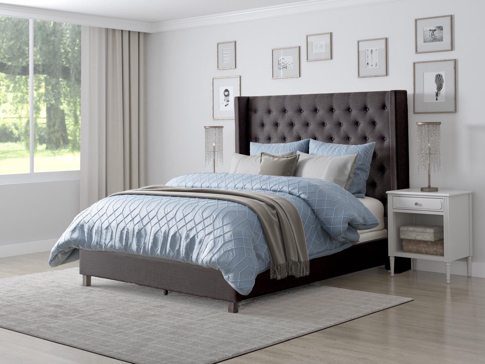 Dark grey tufted king bed with upholstered headboard, wooden legs, and elegant design.