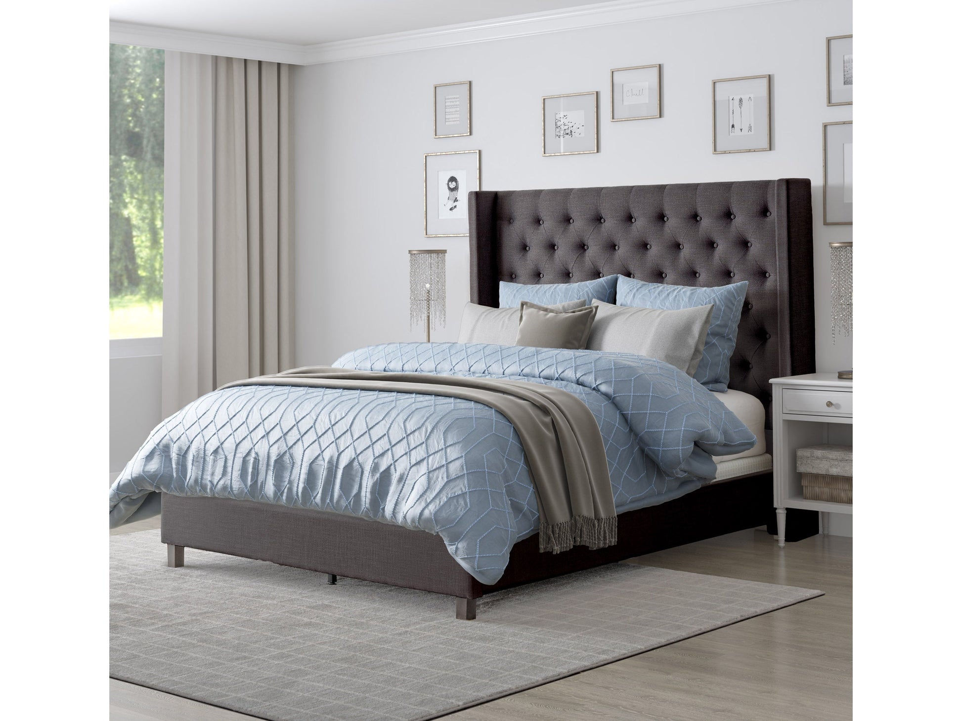 Dark grey tufted queen bed with wooden legs and upholstered headboard, modern bedroom furniture.