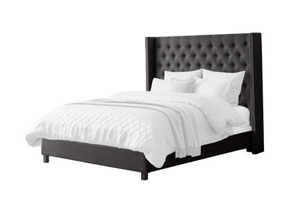 Dark grey tufted queen bed with wooden legs, upholstered headboard, and minimalist design.