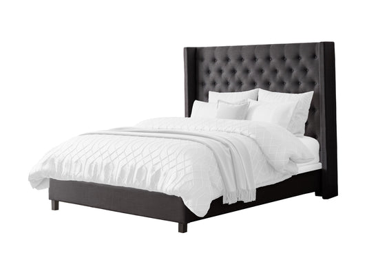 Dark grey tufted queen bed with slats, upholstered headboard, and wooden frame for modern bedroom decor.