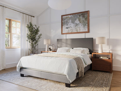 Modern grey queen bed with tufted headboard, wooden legs, and sleek minimalist design.