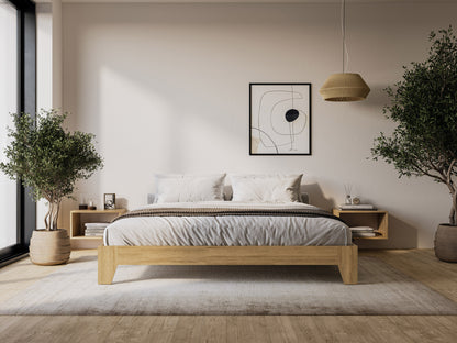 King platform bed with grey upholstered headboard, wooden frame, and modern minimalist design.