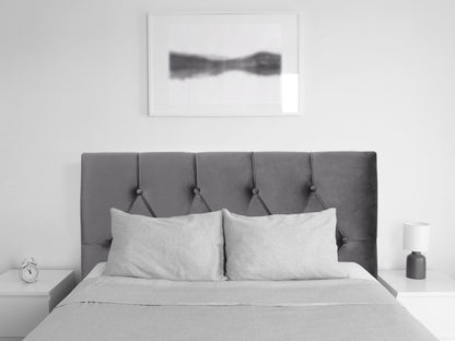 Dark grey velvet twin headboard with tufted design and plush texture for a stylish bedroom upgrade.