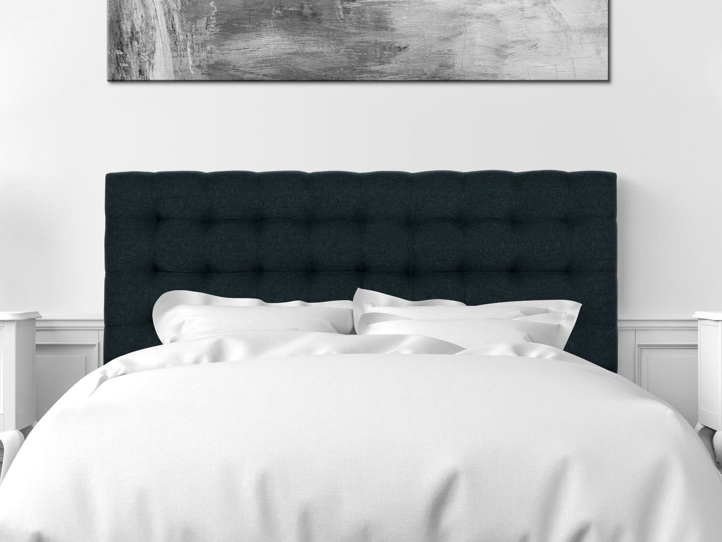 Blue modern queen headboard with tufted fabric, sleek design, and wooden legs in a contemporary bedroom setting.