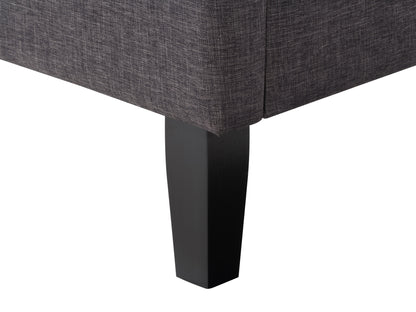 Dark grey button tufted double/full bed with upholstered fabric and sturdy wooden frame.