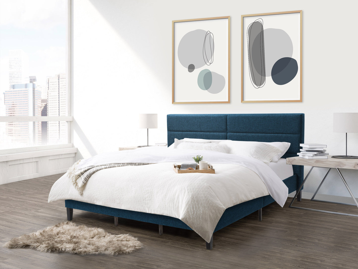 Blue upholstered king bed with tufted headboard, wooden legs, and modern design in a cozy bedroom setting.