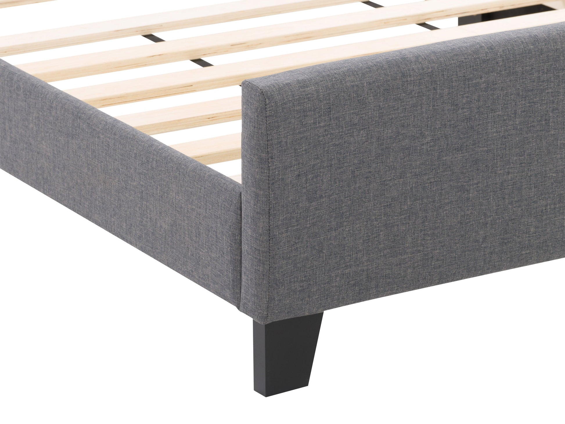 Contemporary grey twin bed with upholstered headboard and wooden slats.