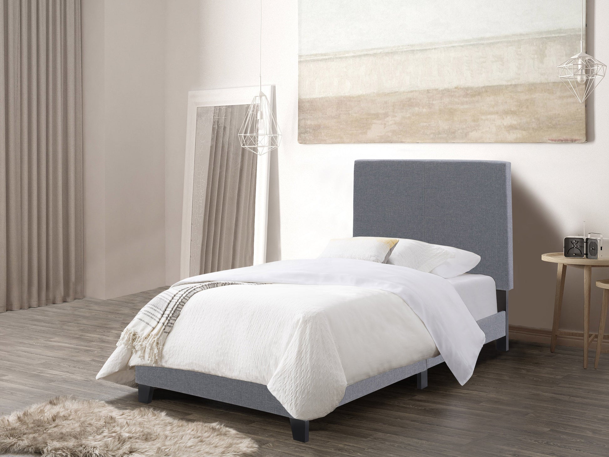 Contemporary grey twin bed with upholstered headboard, wooden legs, and minimalist design.