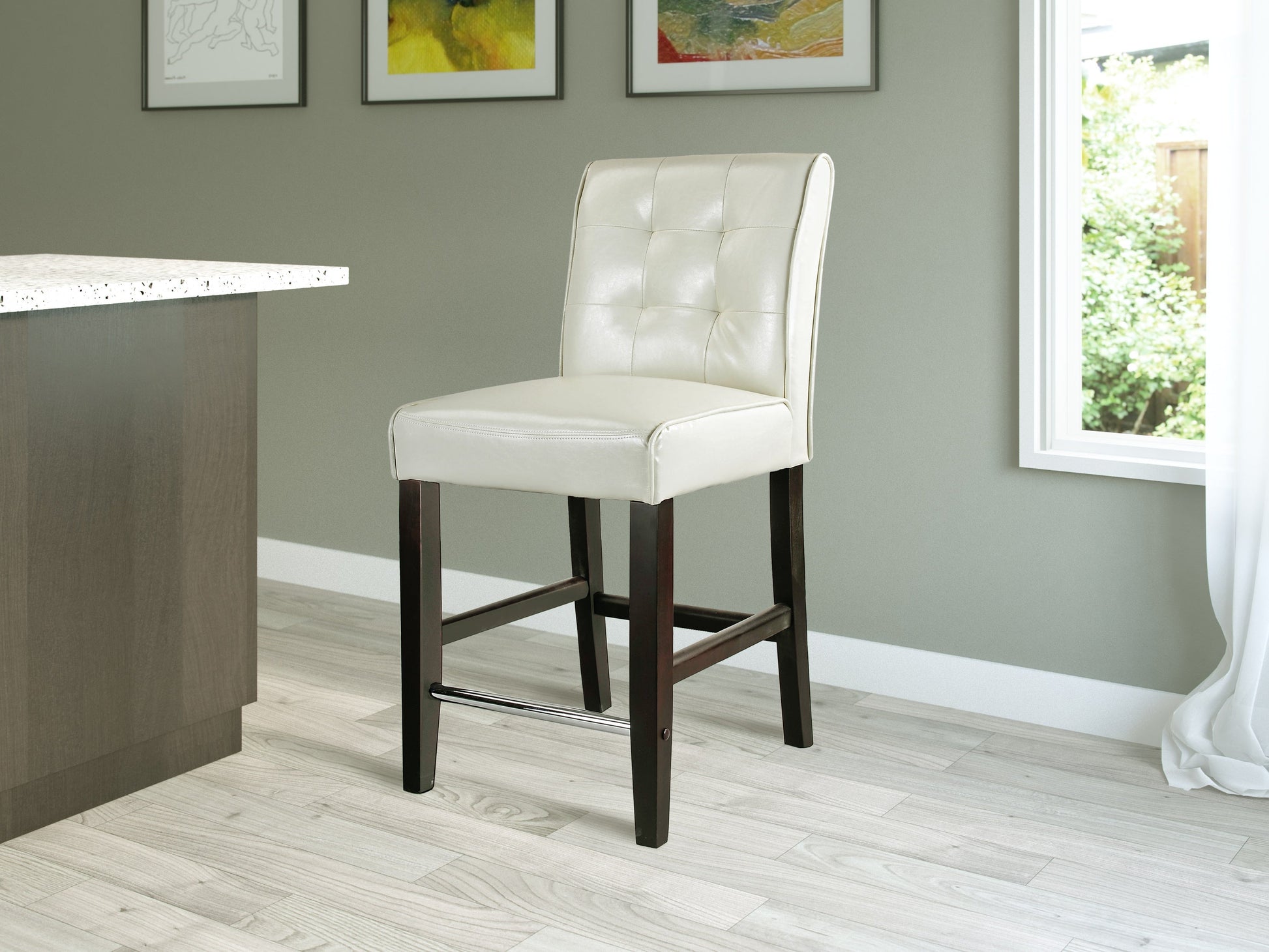 Cream counter height bar stool with cushioned seat, black metal legs, and modern design.