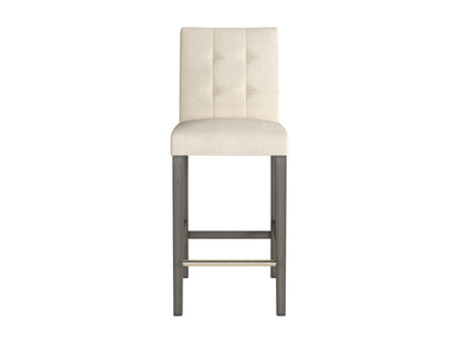 Beige fabric bar stool with cushioned seat, wooden legs, and footrest, perfect for modern kitchen or bar areas.