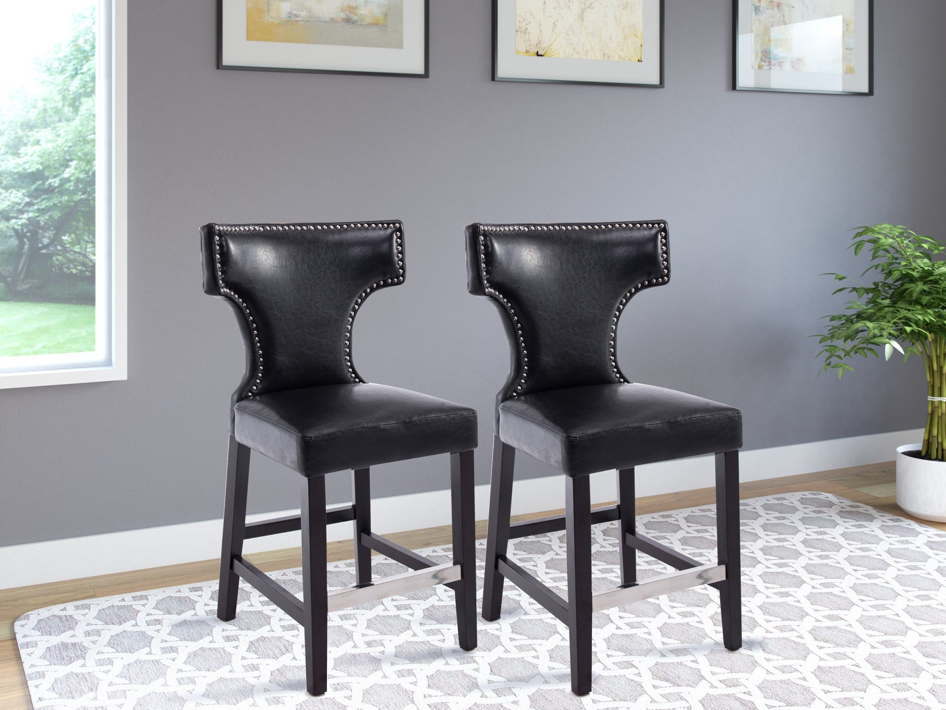 Set of 2 black counter height bar stools with cushioned seats, sleek metal legs, and modern design.