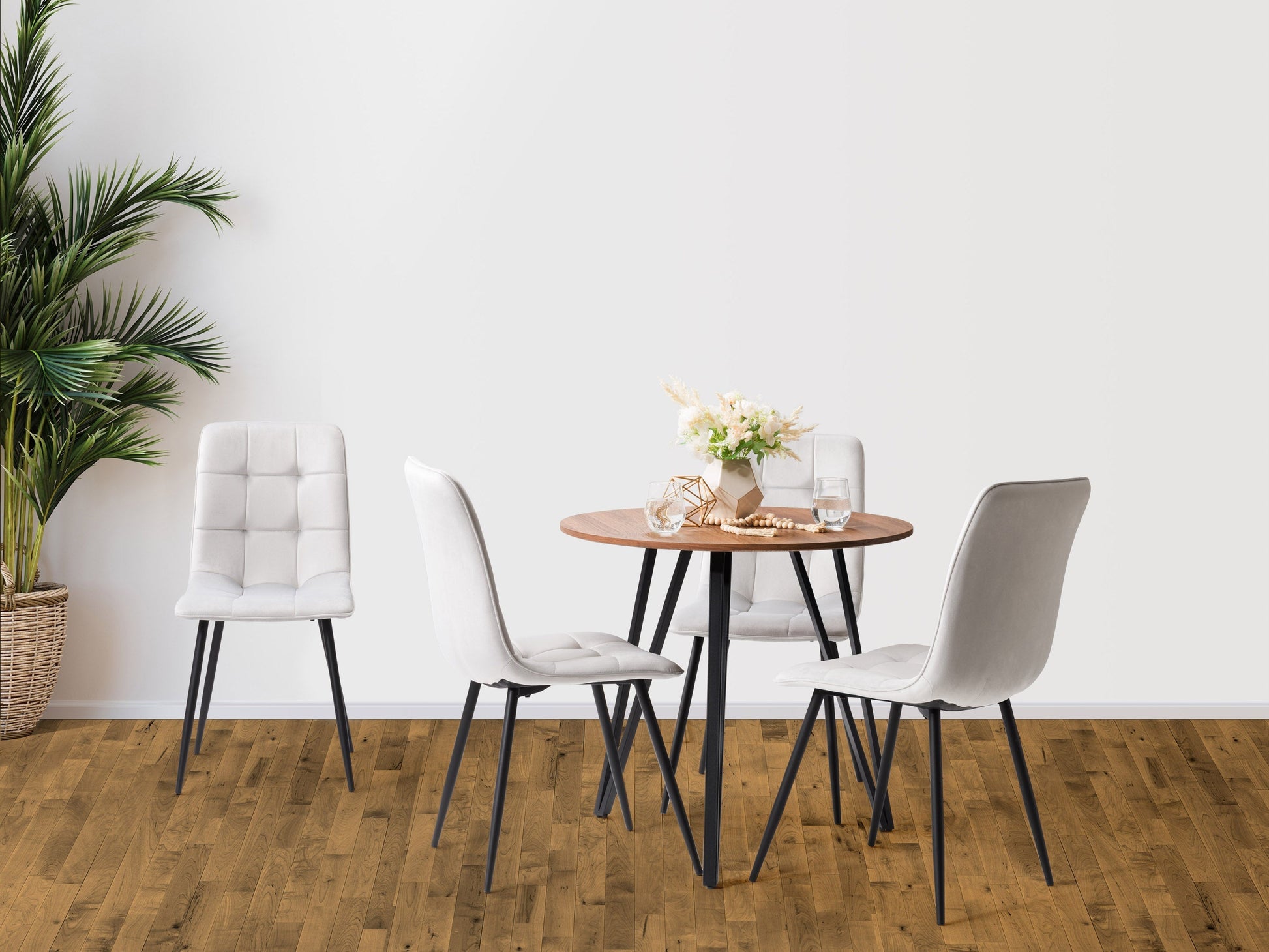 Light grey round dining table set, 5-piece, wooden legs, minimalist design, modern dining room furniture.