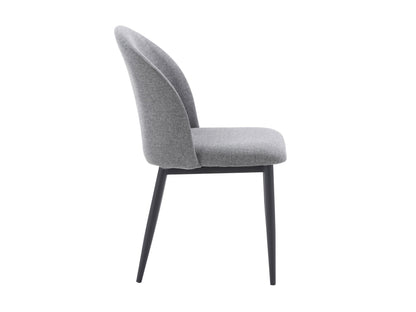 Grey curved dining chairs set with cushioned seats, wooden legs, and sleek modern design for dining rooms.