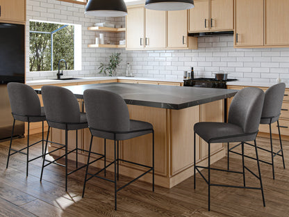 Grey boucle bar stool with wooden legs, curved backrest, and padded seat for modern kitchen or bar settings.