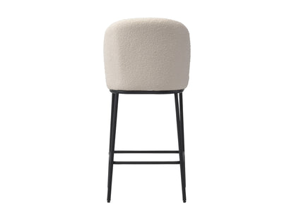 White boucle bar stools set with wooden legs, curved backrest, and modern design – perfect for stylish kitchen or bar areas.