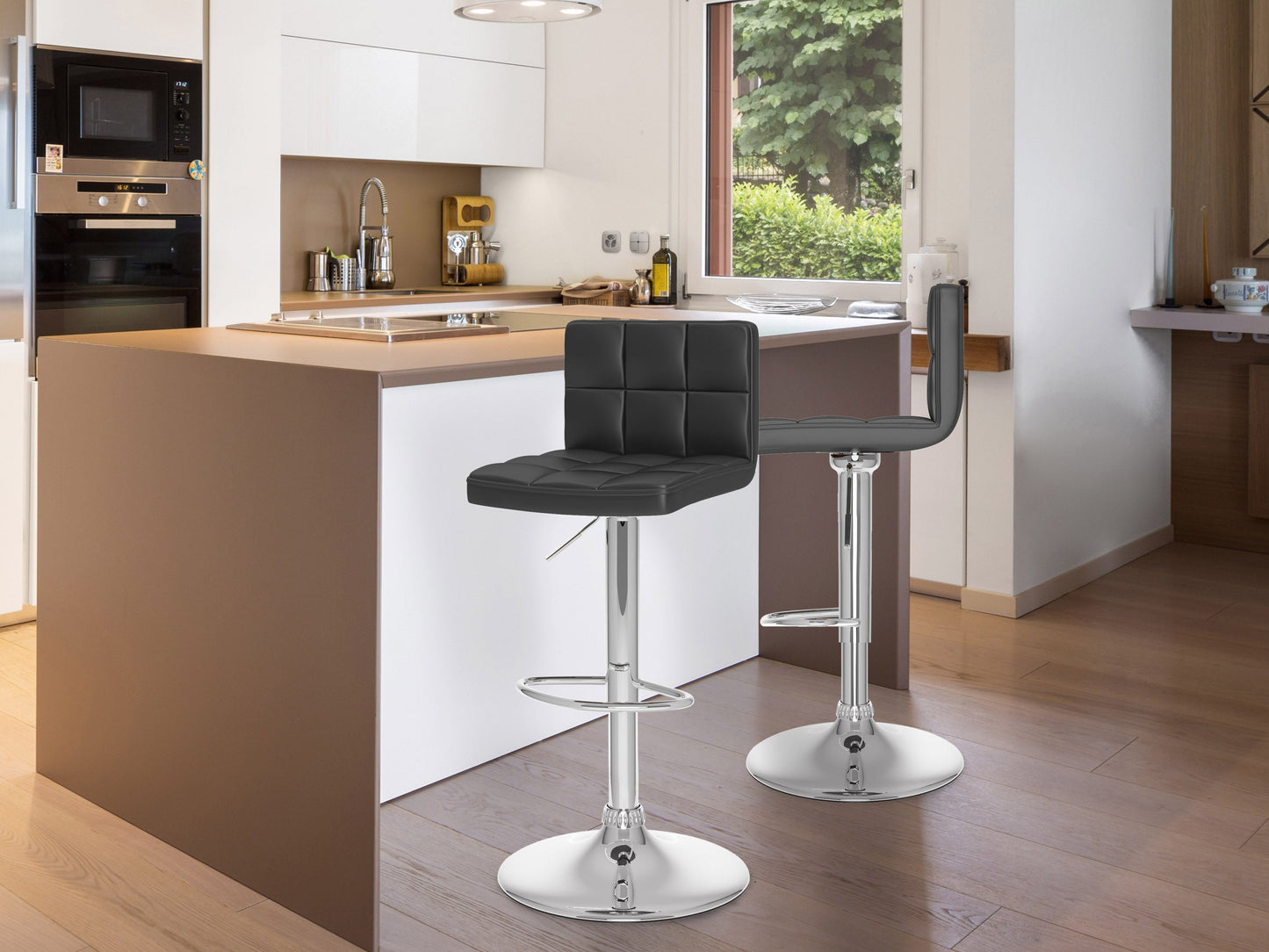 Set of 2 black swivel bar stools with cushioned seats and sleek metal legs, perfect for modern kitchen or bar areas.