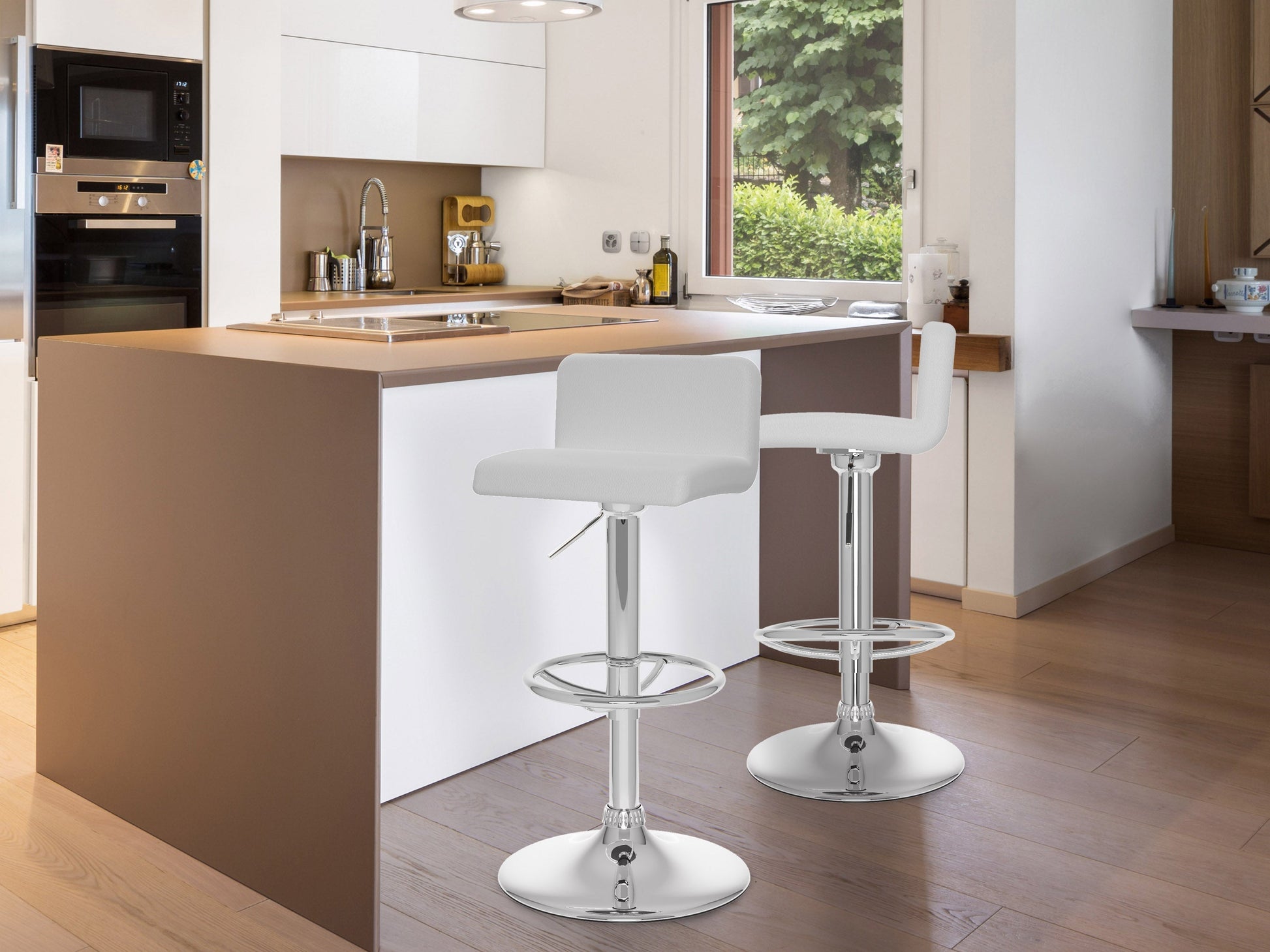 Set of 2 white low back bar stools with cushioned seats and sleek chrome legs.