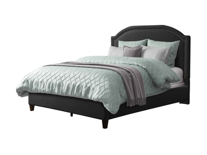 Dark grey upholstered double/full bed with tufted headboard and wooden legs.