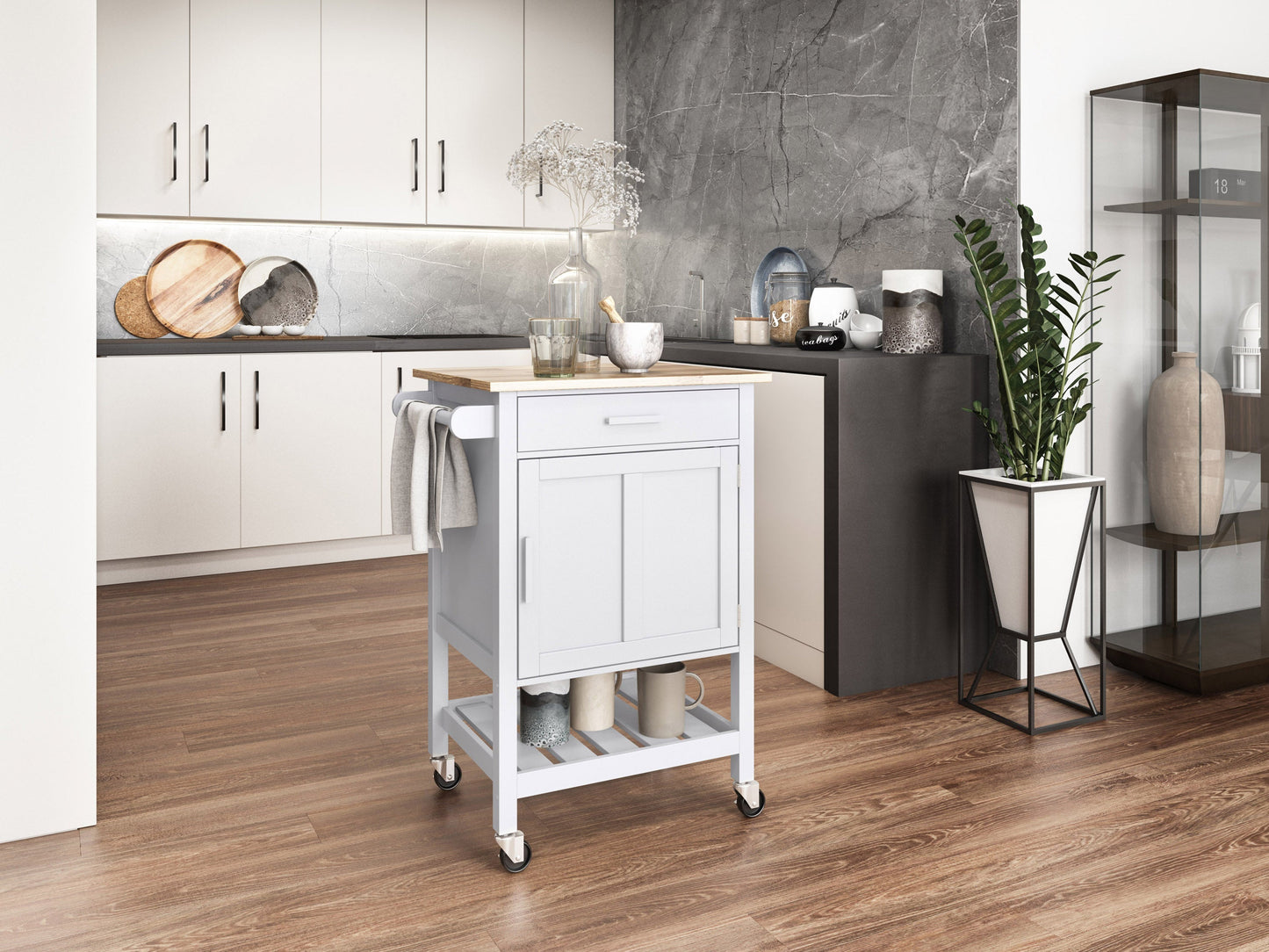 White kitchen cart on wheels with storage shelves, drawer, and towel rack, ideal for versatile kitchen organization.