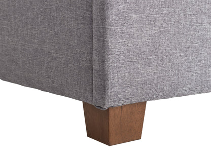 Light grey large storage ottoman with tufted fabric and wooden legs, versatile seating and storage solution.