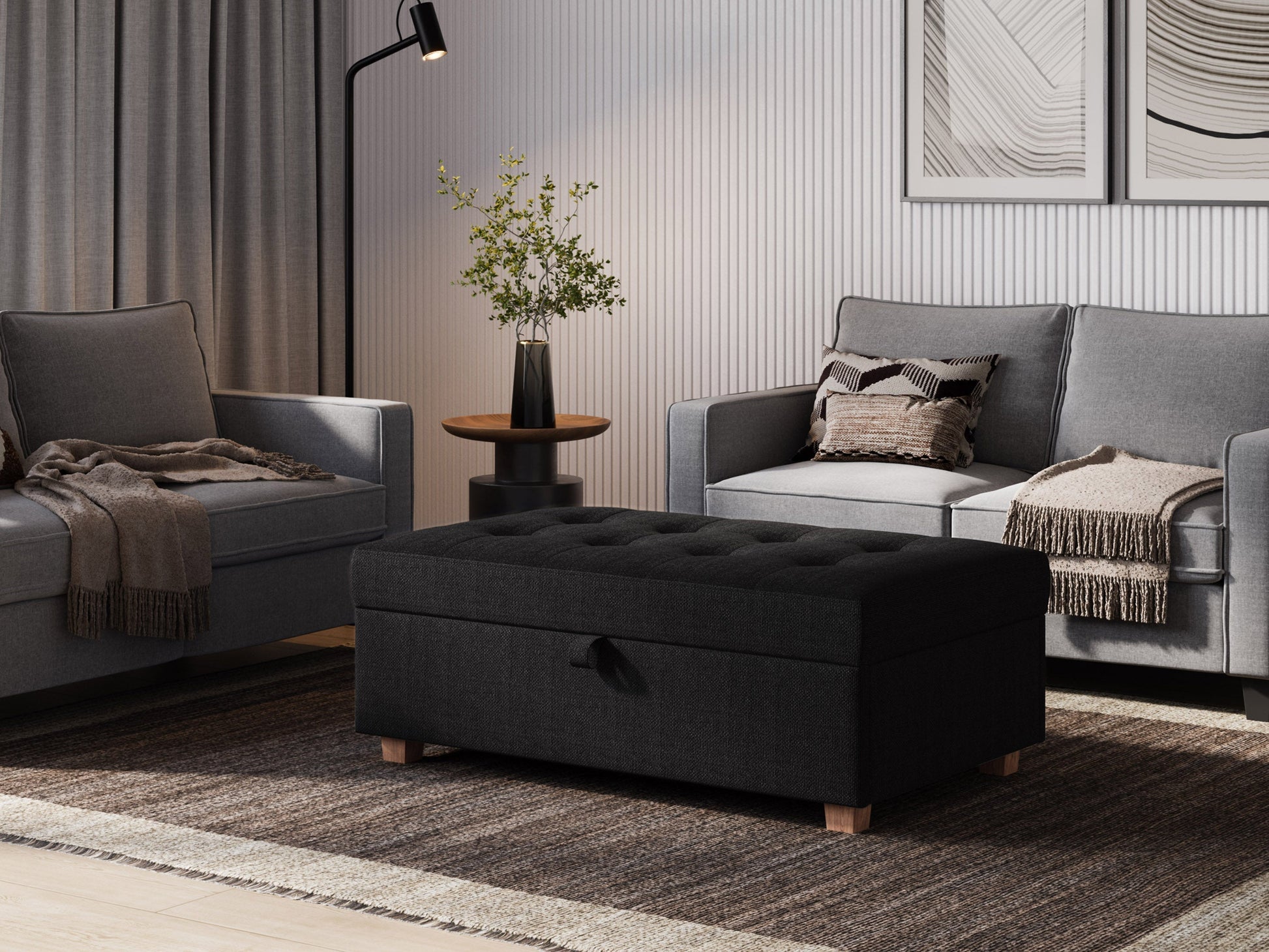 Dark grey large storage ottoman with tufted fabric, wooden legs, and spacious interior for versatile home organization.