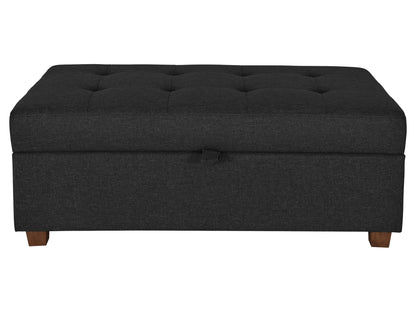 Large dark grey storage ottoman with tufted fabric, wooden legs, and spacious interior.