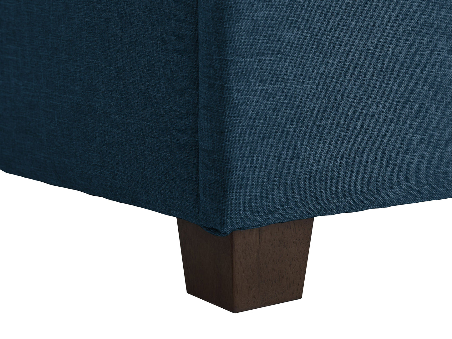 Blue storage ottoman with tufted fabric, wooden legs, and spacious interior storage compartment.