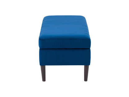 Blue velvet storage ottoman with gold metal legs, tufted top, and spacious interior.