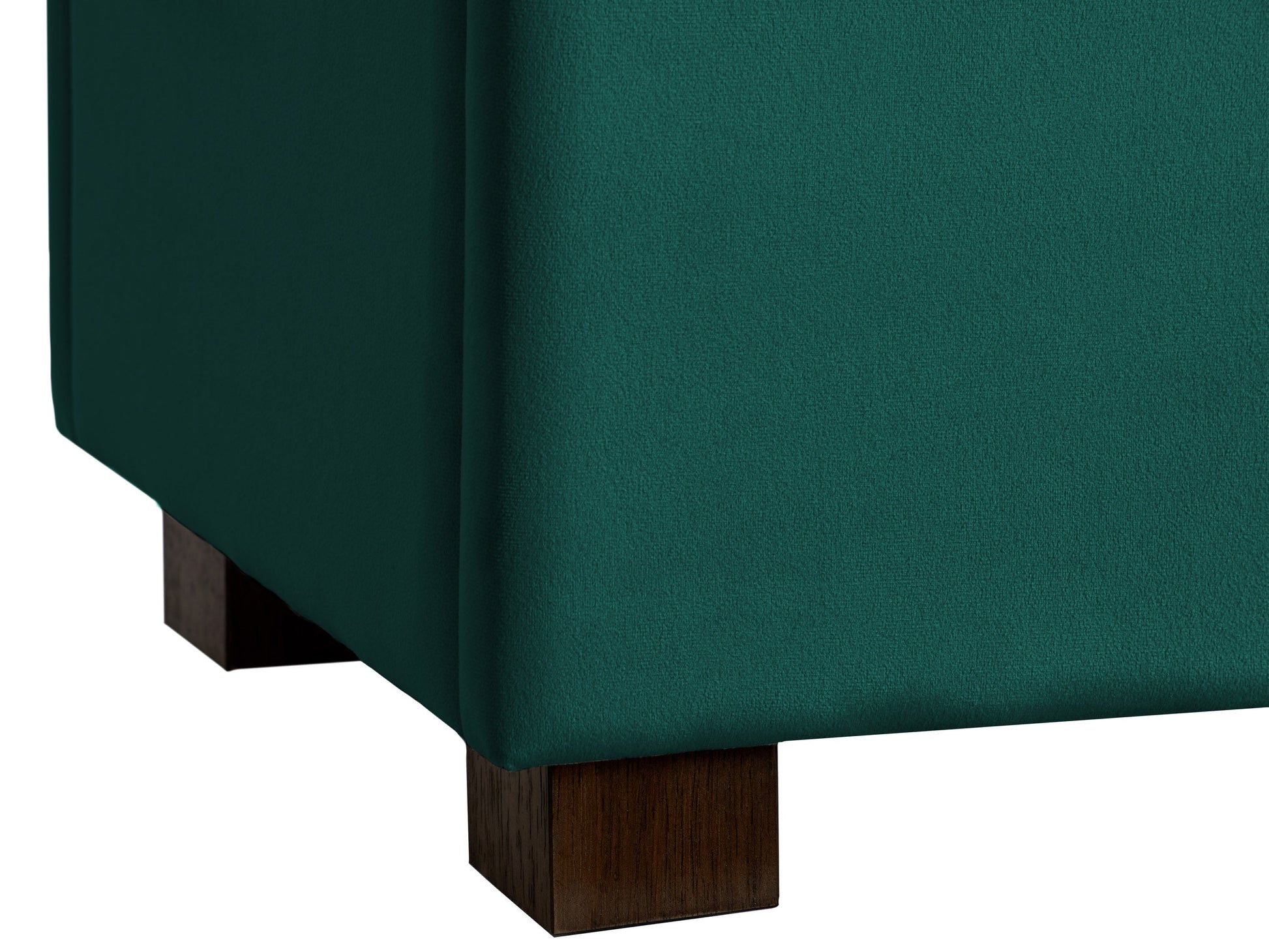 Green velvet storage ottoman with tufted cushion and gold metal legs.