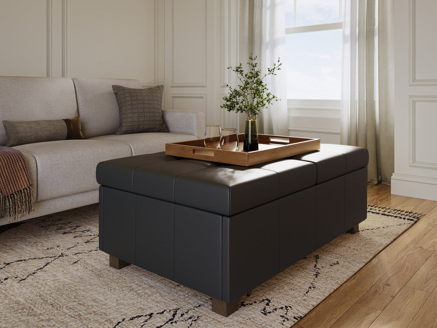 Matte black storage ottoman with tufted top, sleek design, and hidden compartment.