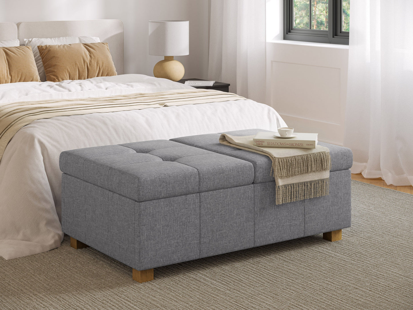 Silver brown double storage ottoman with tufted fabric, wooden legs, and spacious interior storage.