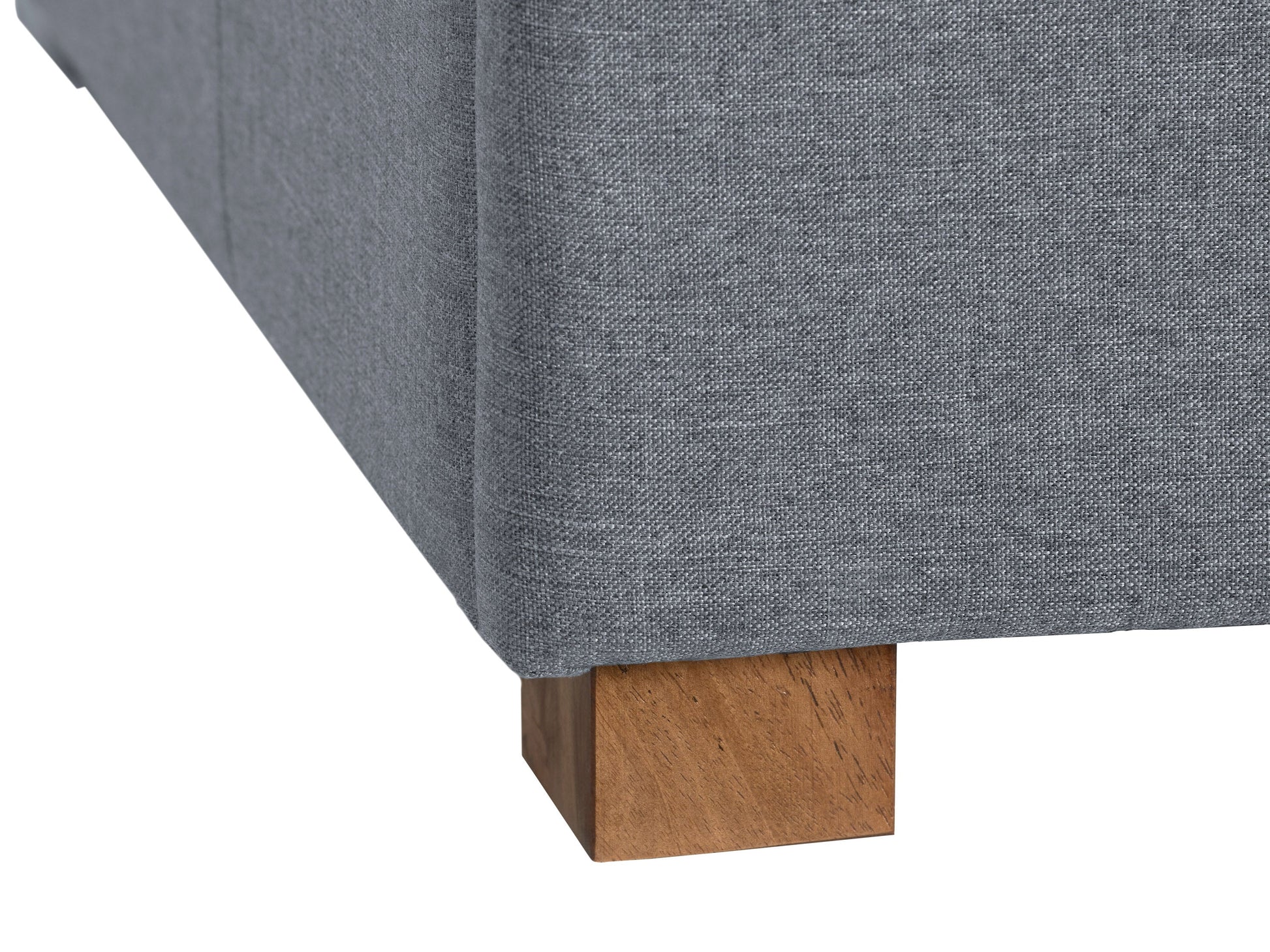 Grey double storage ottoman with tufted fabric, wooden legs, and spacious compartments.