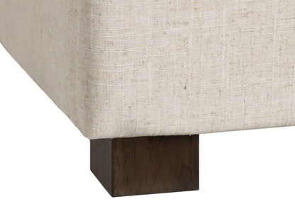 Beige double storage ottoman with tufted top, wooden legs, and spacious interior storage.