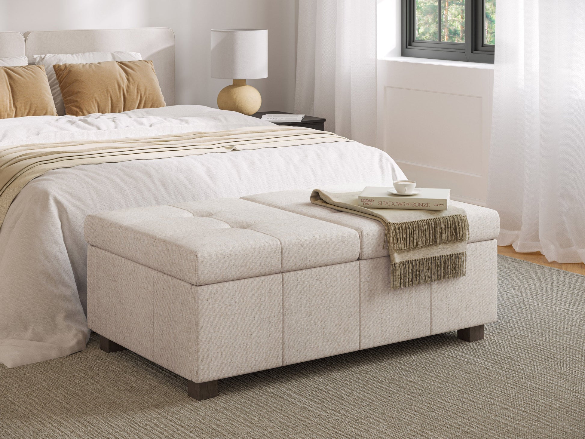 Beige double storage ottoman with tufted top, wooden legs, and spacious interior compartment.