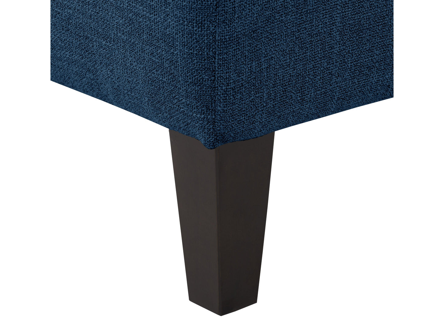 Navy blue accent bench with tufted fabric, wooden legs, and modern design.