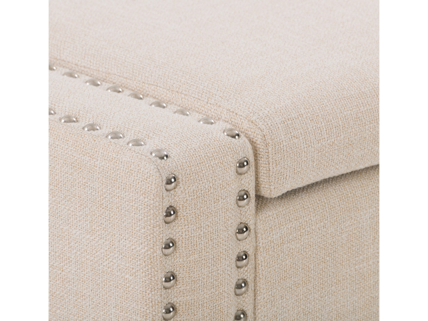 Beige storage ottoman with tufted fabric, wooden legs, and spacious interior compartment.