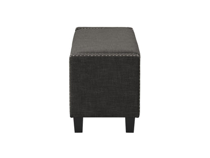 Dark grey storage ottoman with tufted fabric, wooden legs, and versatile design for living room or bedroom.