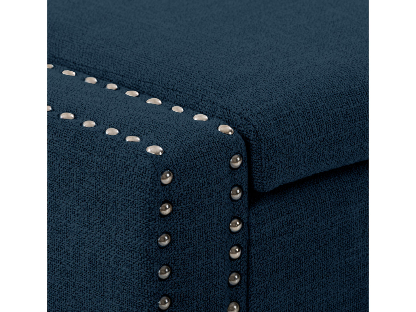 Navy blue storage ottoman with tufted fabric, wooden legs, and hidden compartment.