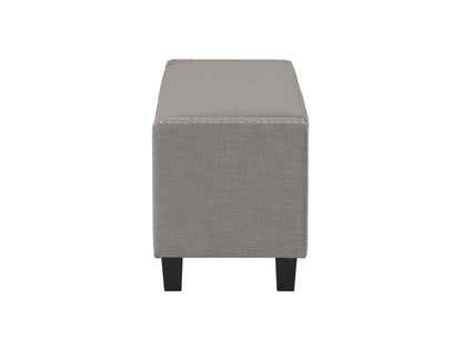 Light grey storage ottoman with tufted fabric, wooden legs, and spacious interior.