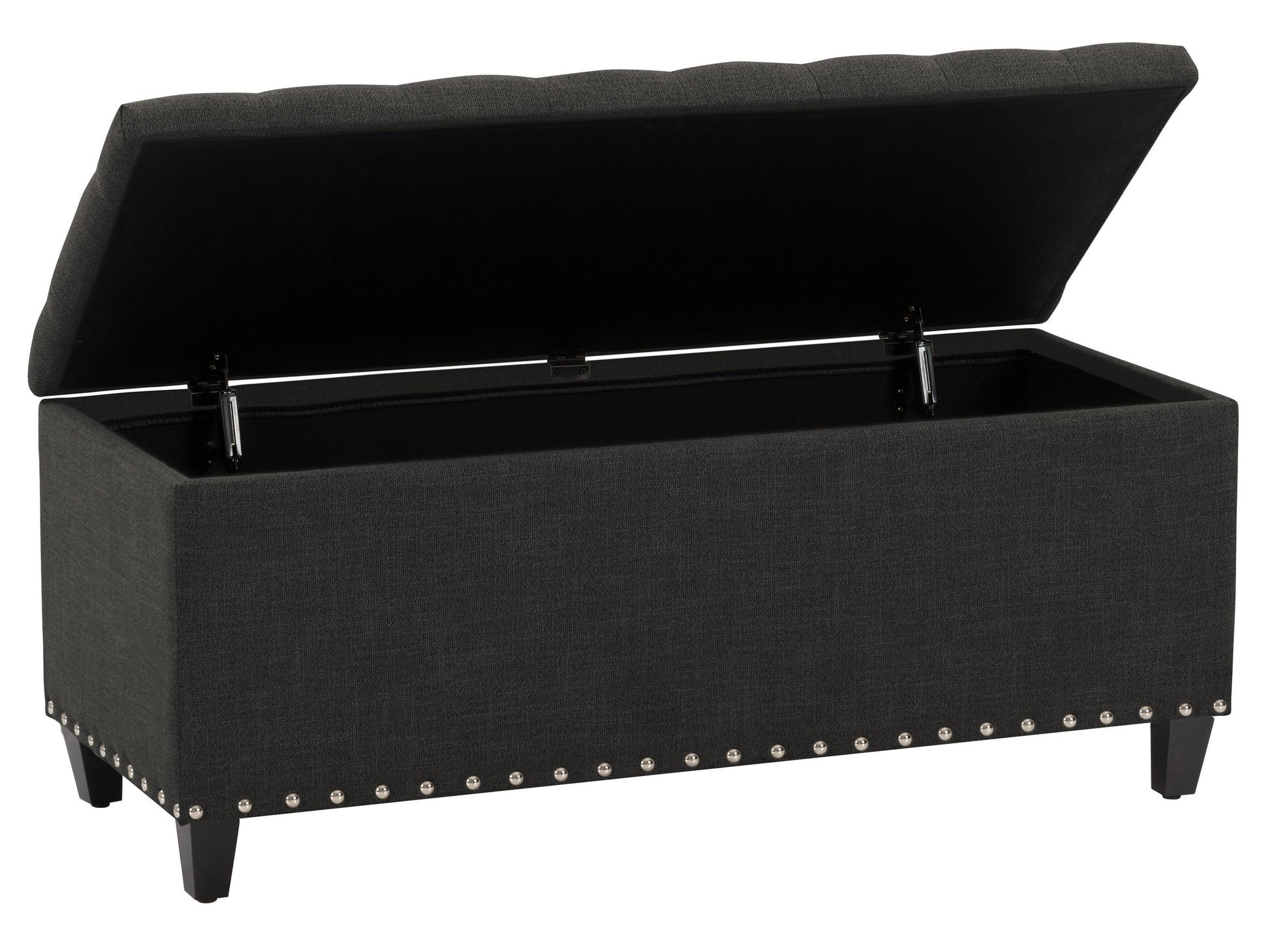 Dark grey tufted storage ottoman with fabric upholstery and wooden legs.