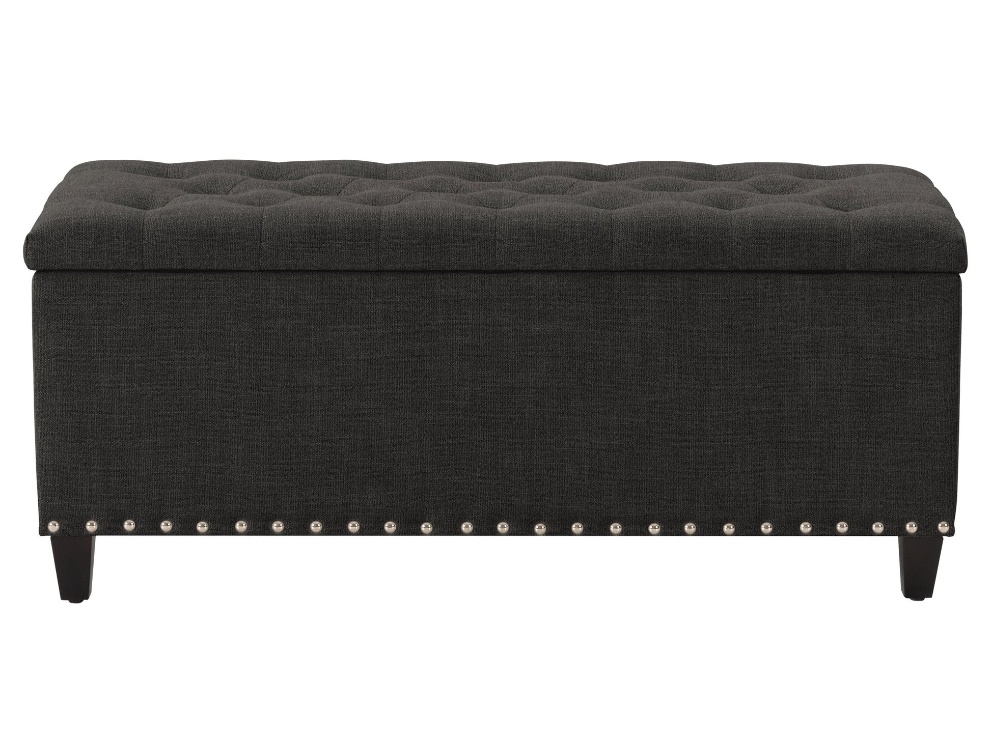 Dark grey tufted storage ottoman with fabric upholstery and wooden legs, perfect for modern living rooms.