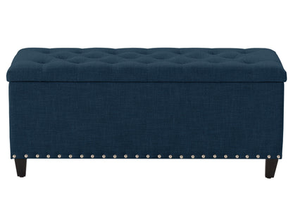 Navy blue tufted storage ottoman with wooden legs and fabric upholstery, perfect for living room or bedroom decor.