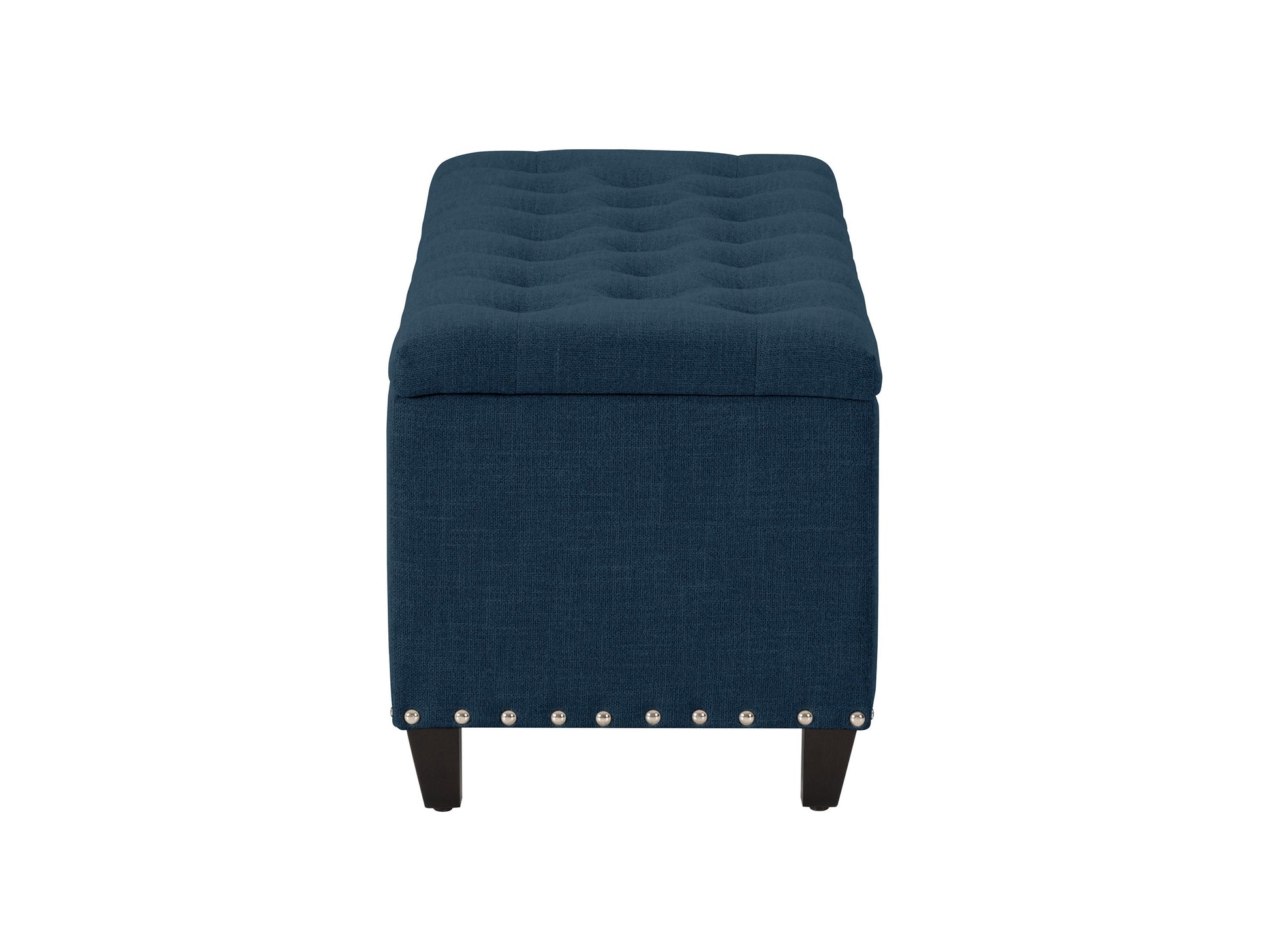 Navy blue tufted storage ottoman with wooden legs and soft fabric upholstery.