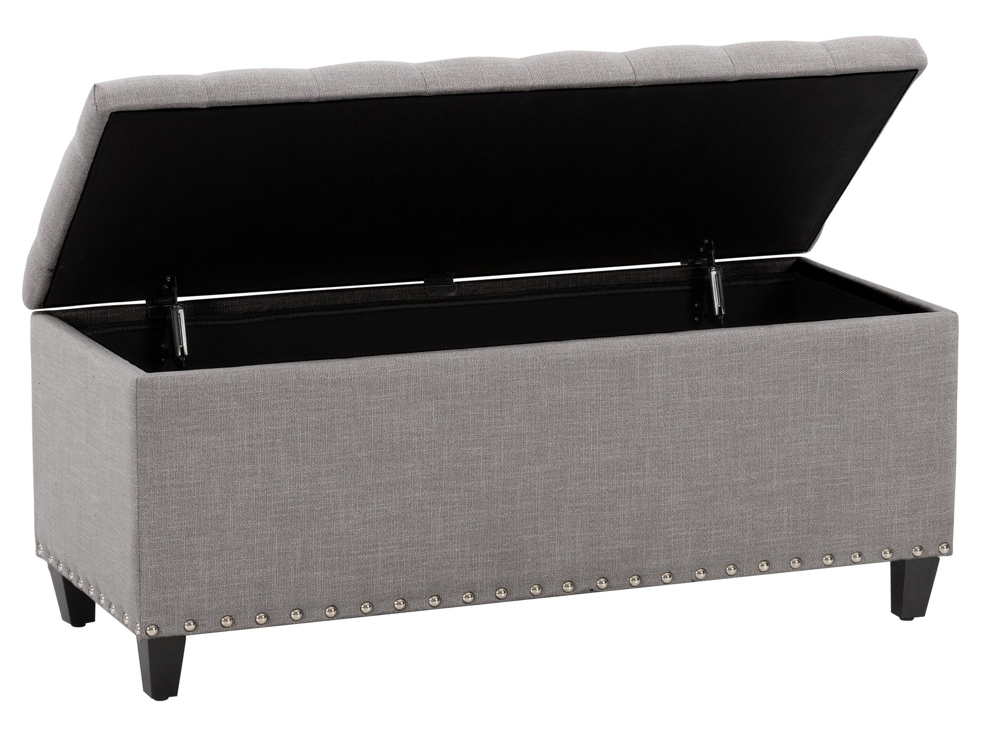 Light grey tufted storage ottoman with wooden legs and minimalist design.