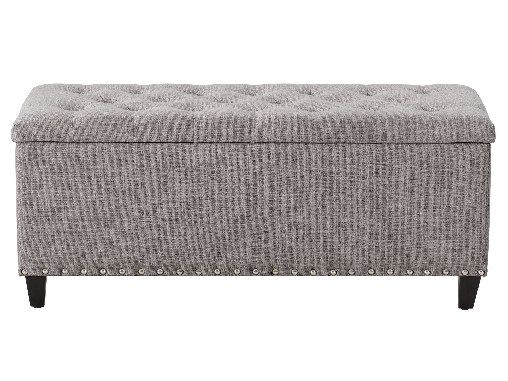 Light grey tufted storage ottoman with wooden legs and soft fabric upholstery.